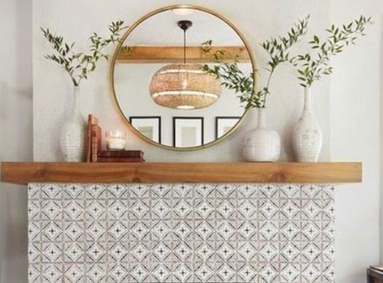 Image of a gold round mirror with a cabinet